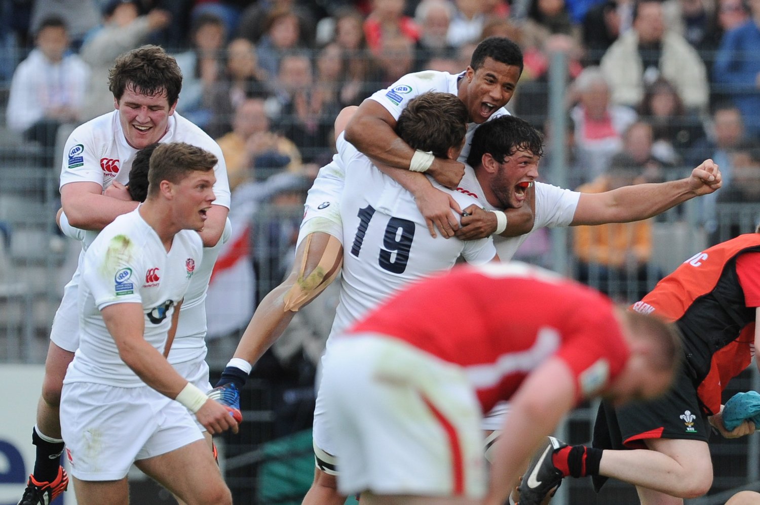 Anthony Watson and Harry Wells at full-time in the 2013 final.