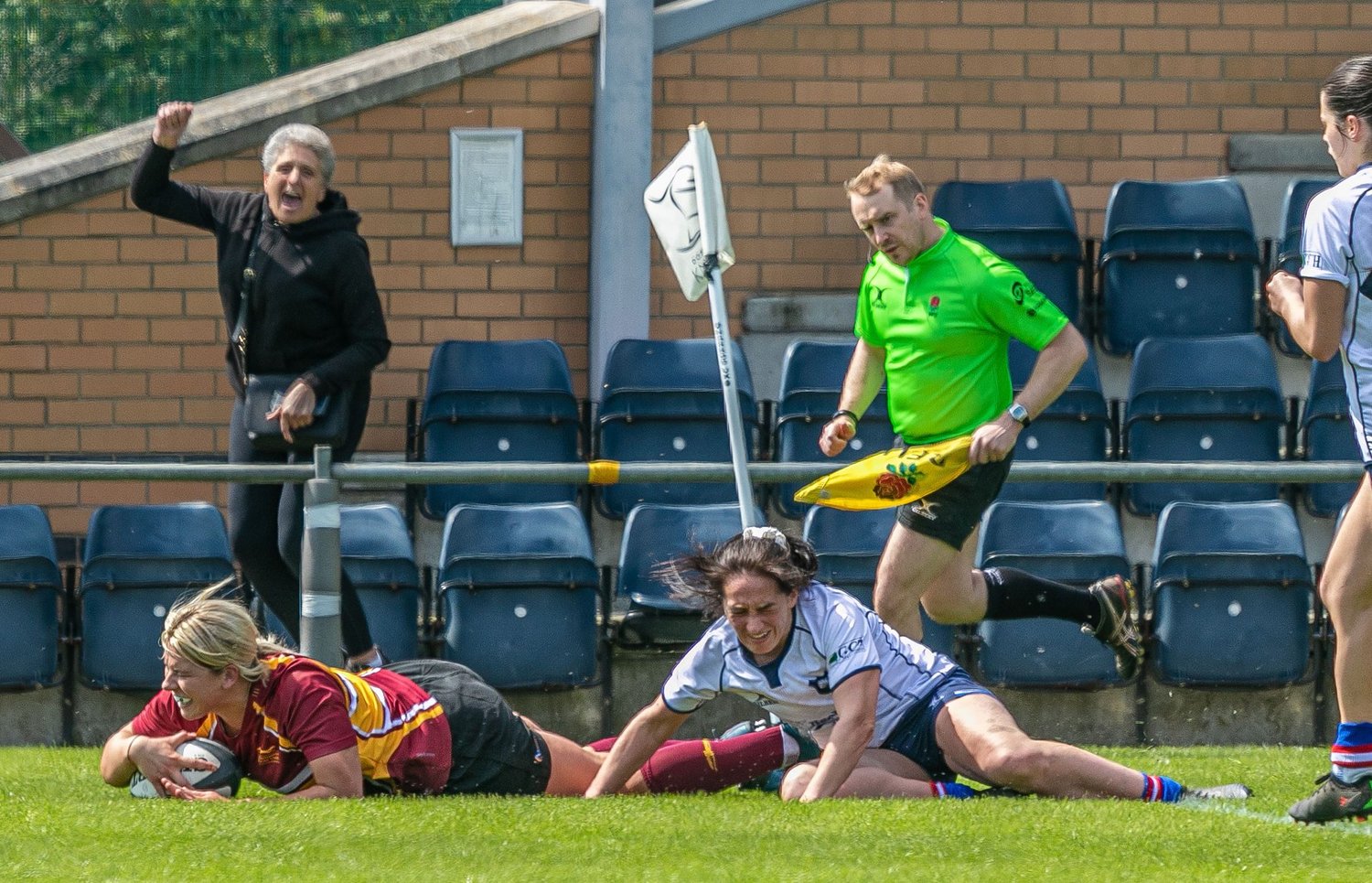 Kat Turner's Mum cheers her on from the sidelines as the forward goes over