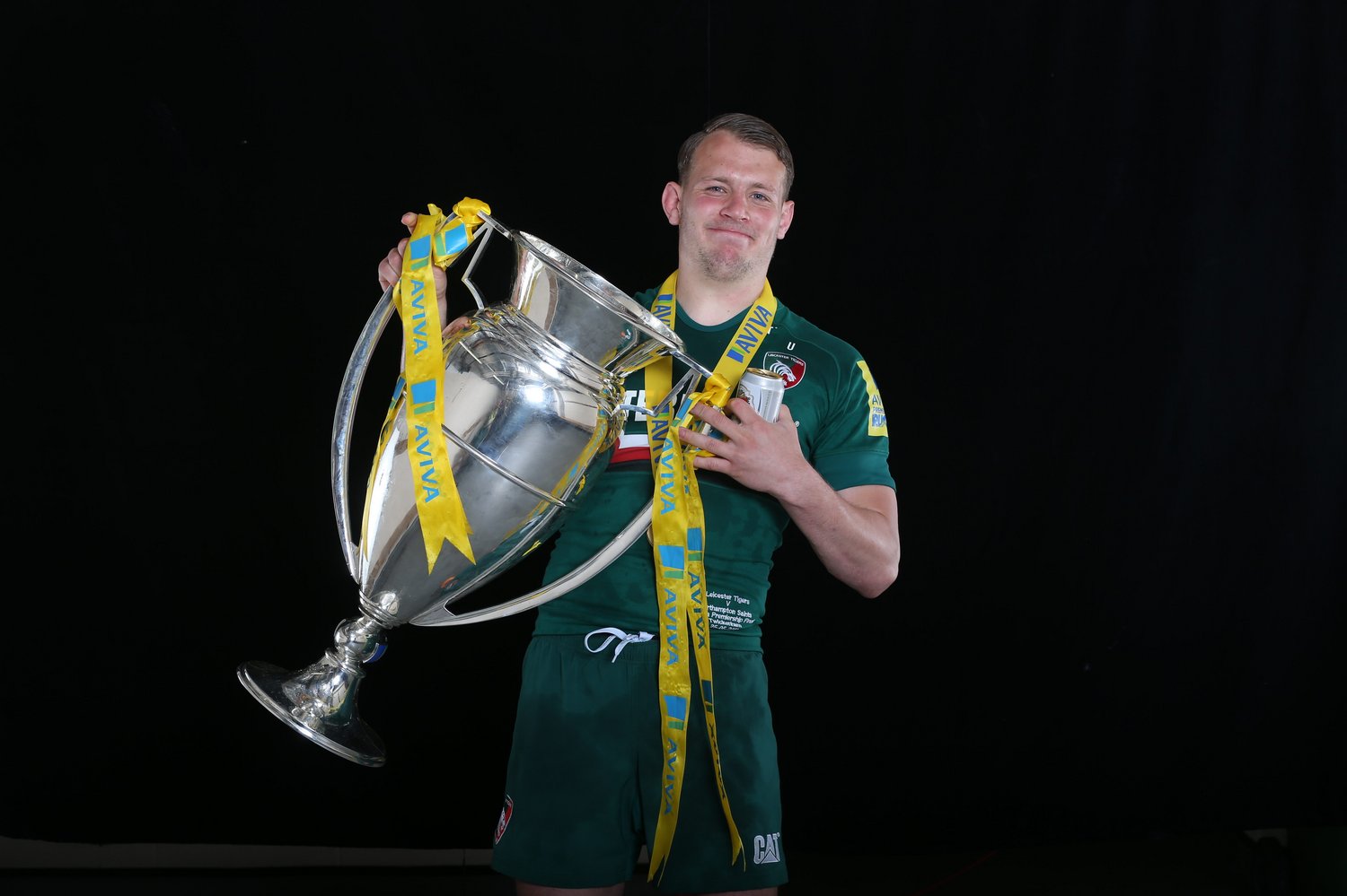 Sam Harrison celebrating a Premiership Rugby title with Tigers