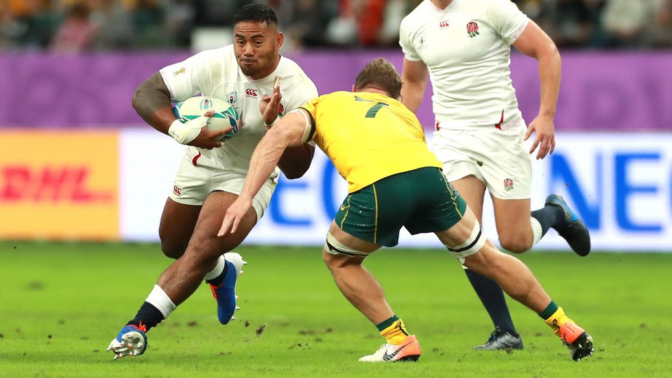 Manu Tuilagi carries ball for England in the quarter-final victory