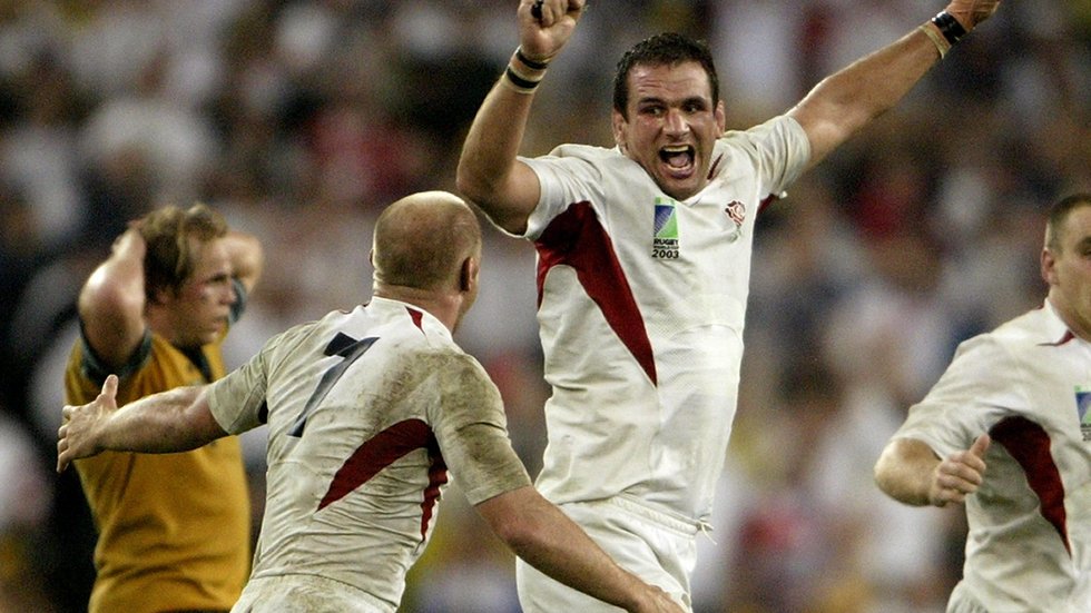 Neil Back and Martin Johnson celebrate World Cup Final victory at the final whistle in Australia