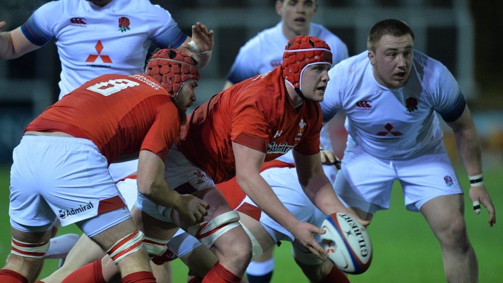 Joe Heyes (right) stands in the England defence in Friday's win over Wales Under-20s