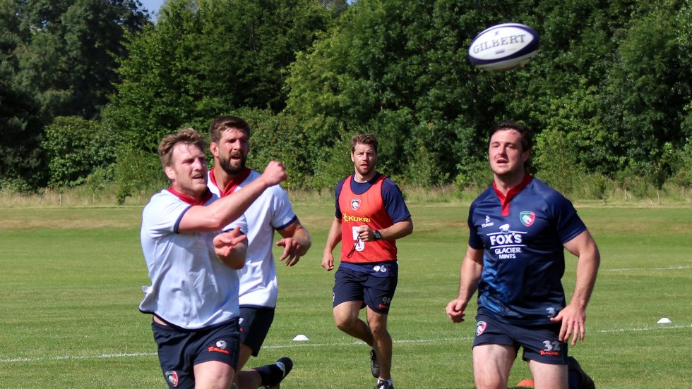Brendon O'Connor gets his pass away in a game of touch rugby