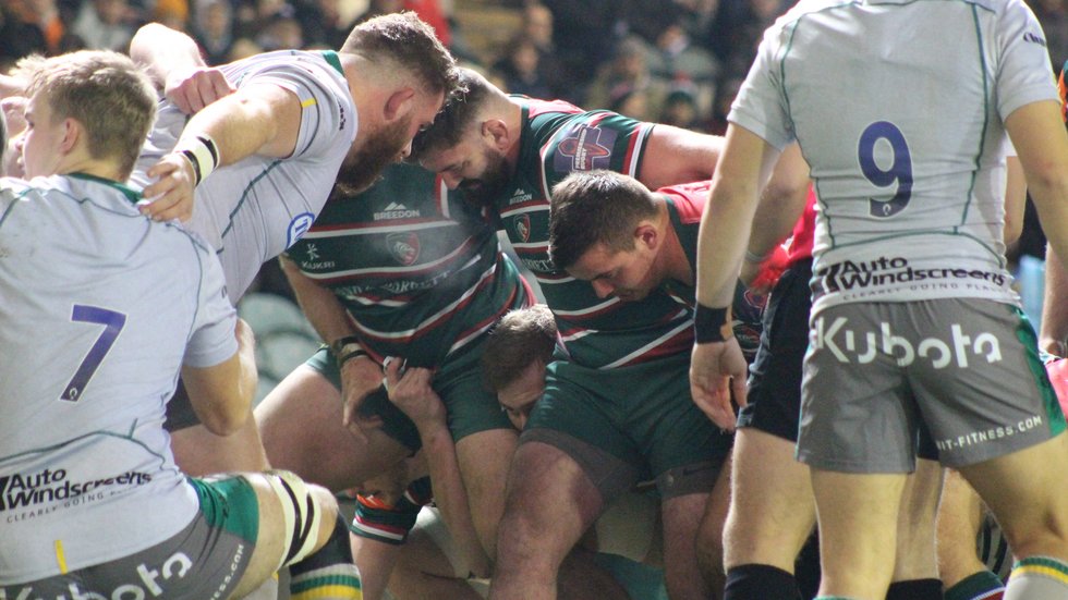 The front rows come together at scrum-time during Monday's Shield derby