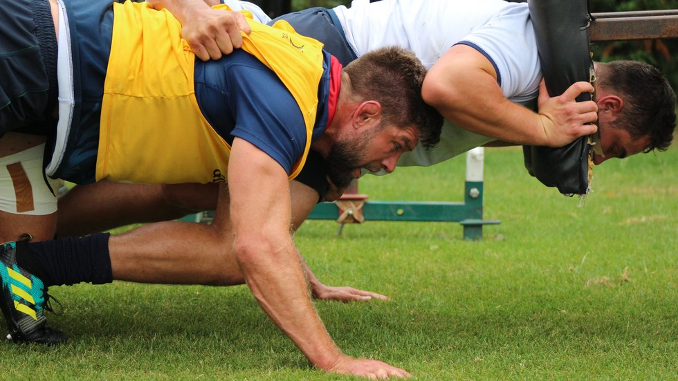 Mike Fitzgerald and Owen Hills take part in a scrum drill at the club's Oval Park Training Ground.