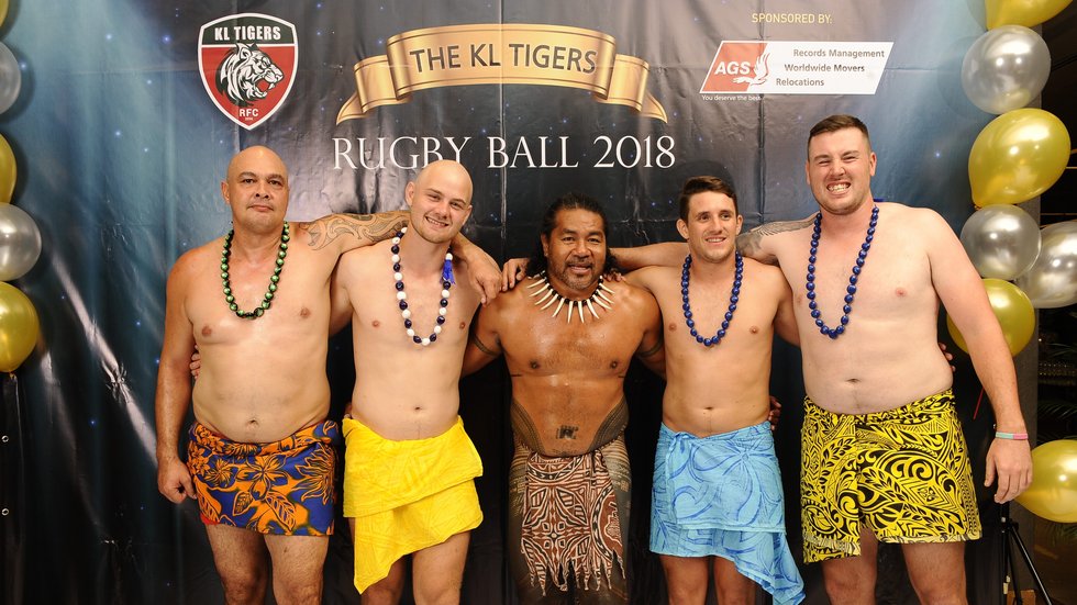 Joe Cain [right] at the KL Tigers Rugby Ball 2018 alongside Freddie Tuilagi [middle]
