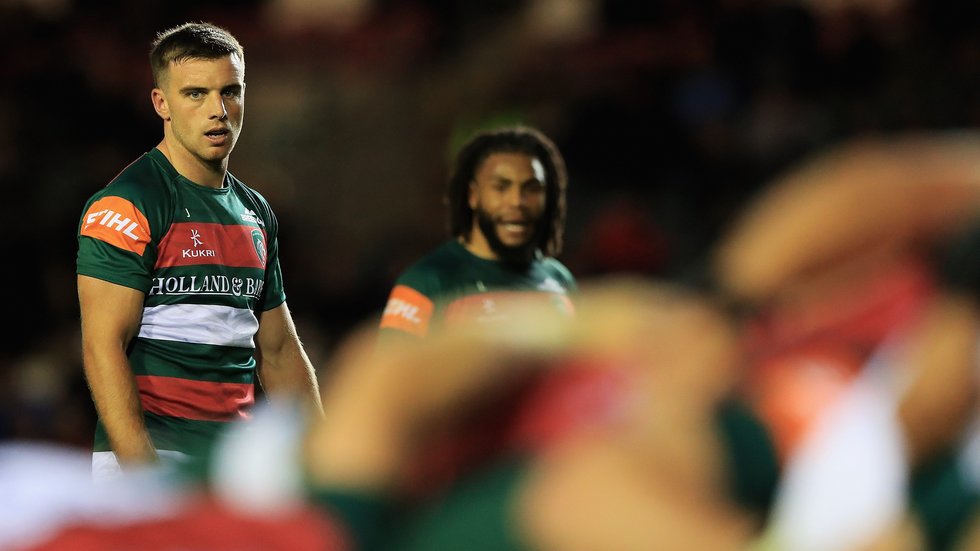 George Ford and Kyle Eastmond watch on as Tigers and Irish forwards come together for a scrum at Welford Road during the 2018/19 pre-season fixture