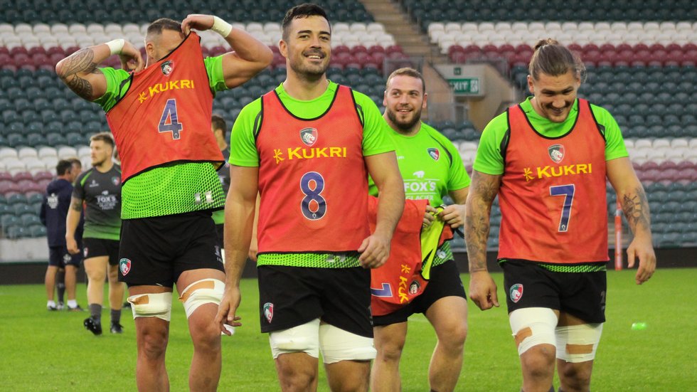 Jordan Coghlan, Guy Thompson and team-mates share a joke following the Team Run in preparation for the Premiership Cup clash with Exeter Chiefs at Welford Road